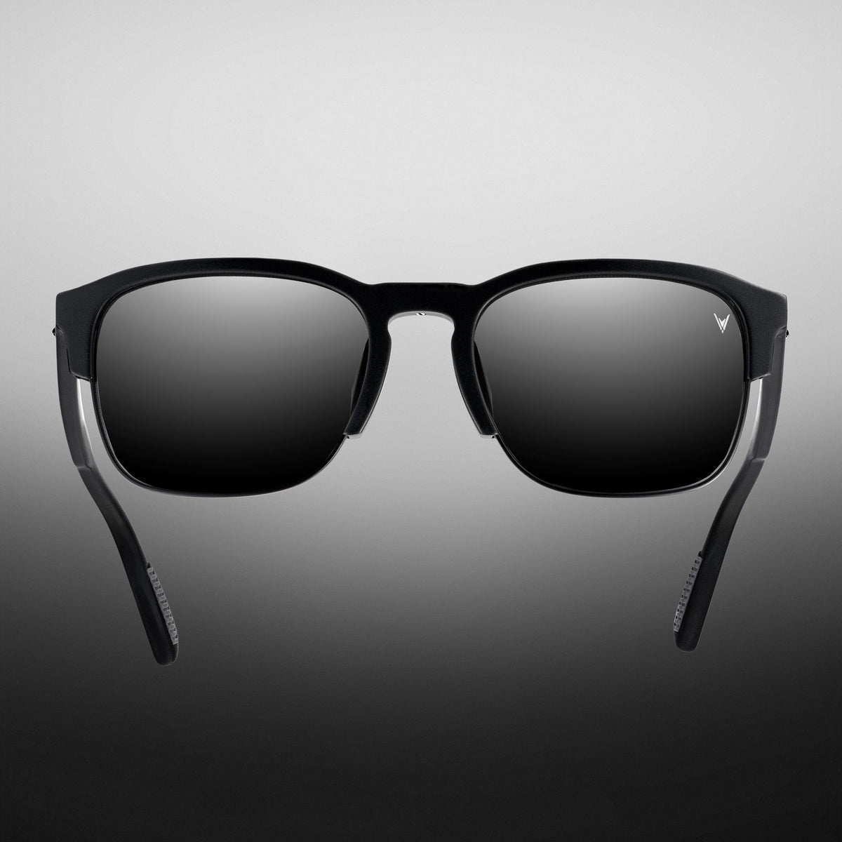 Black sunglasses with a gradient gray background