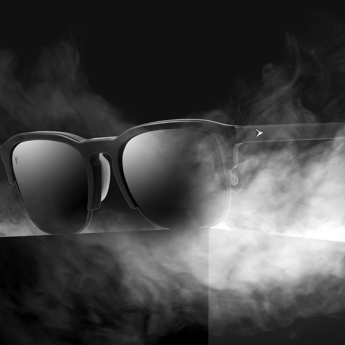 Sunglasses with reflective lenses on a smoky background