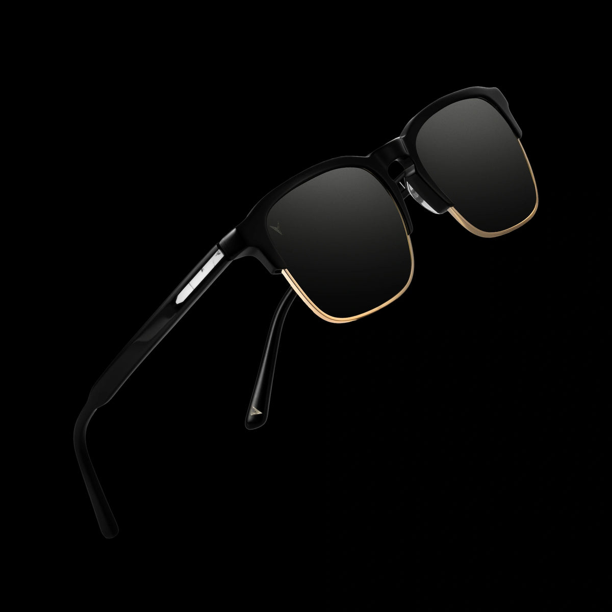 Black sunglasses with gold accents on a transparent background