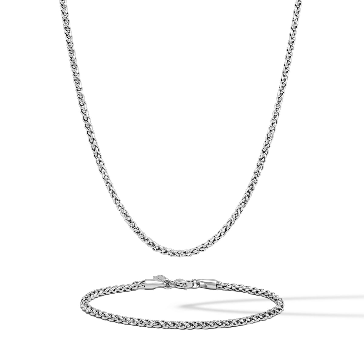 Silver chain necklace on a white background