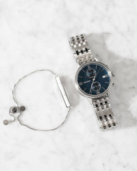 The Reign Silver 316L Stainless Steel Strap Blue Watch Face Silver Case Clasp Silver Accents